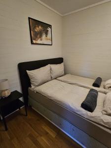 เตียงในห้องที่ Private room - 5 in a luxury villa CHALET STYLE