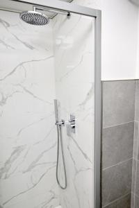 A bathroom at AT HOME COLOSSEO