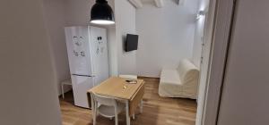 TV a/nebo společenská místnost v ubytování Corte San Pietro -Apartments