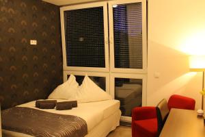 Gambar di galeri bagi MOMOMOTEL - Self Check-In Hotel am Stadion di Cologne +17 gambar
