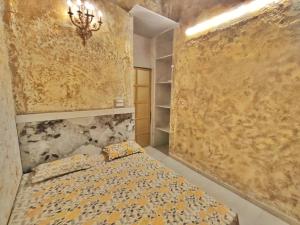 a bedroom with a bed and a wall at Wadhwani's Haveli villa in Royal Palms in Mumbai +13 photos