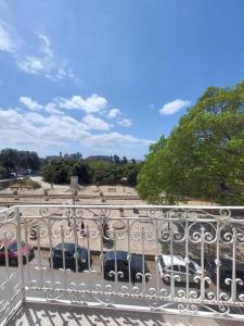 a group of cars parked in a parking lot at Studio Suite near Valletta in Il-Furjana