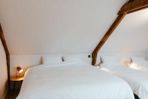 Postel nebo postele na pokoji v ubytování Ruime en Zonnige 5 sterren Vakantiewoning SVN7tien