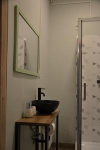 Koupelna v ubytování Hotel Mergera