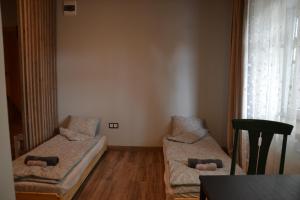 Postel nebo postele na pokoji v ubytování Hotel Mergera