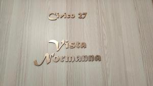 a sign for a visseria notabilida on a wall at Luna Normanna in Rutigliano