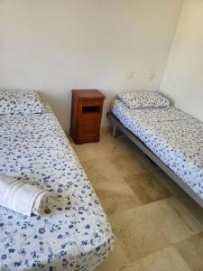Postel nebo postele na pokoji v ubytování Diamond Room vue Pool Fuengirola 3