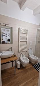 Koupelna v ubytování Corte San Pietro -Apartments + 33 fotografií