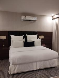 Olive Tree Hotel客房内的一张或多张床位