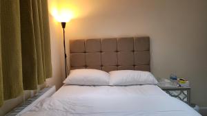 Cama o camas de una habitación en Nest & Rest En-Suite