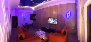 TV a/nebo společenská místnost v ubytování Blossom Apartment