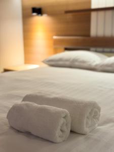 Postel nebo postele na pokoji v ubytování Apartman Madness