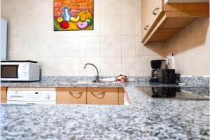 Kuchyň nebo kuchyňský kout v ubytování AC Apartaments Pleta Soldeu