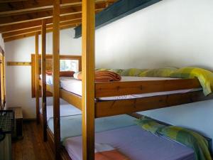 Postel nebo postele na pokoji v ubytování Xalet de muntanya en Parc Natural a 2000 metres