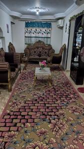 A bed or beds in a room at the flowers apartment