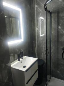 Ένα μπάνιο στο Apartament Chopina 17