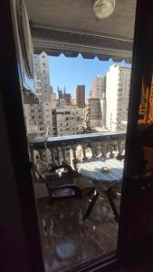 A balcony or terrace at the flowers apartment