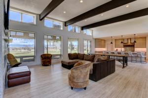 a living room with a couch and chairs and a table at Contemporary Wyoming Luxury in Sheridan