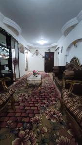 A bed or beds in a room at the flowers apartment
