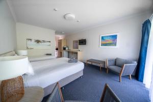 Postel nebo postele na pokoji v ubytování Woolgoolga Coast Motel