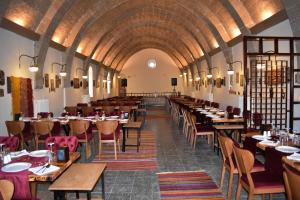 a restaurant with tables and chairs in a room at Karballa Hotel in Aksaray +26 photos