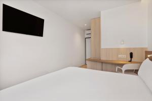 TV a/nebo společenská místnost v ubytování B&B HOTEL Viana do Castelo