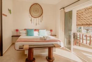 Postel nebo postele na pokoji v ubytování Hotel Puerto Holbox Beach Front