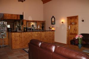 Ο χώρος του lounge ή του μπαρ στο An Portán Guest House