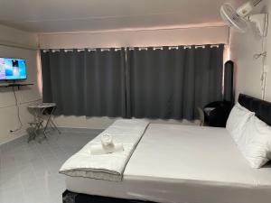 Dailyroom C3 by Anna客房内的一张或多张床位