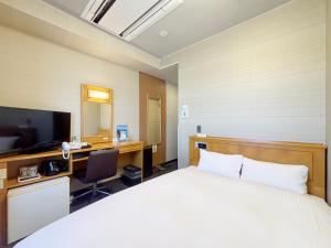 Μια τηλεόραση ή/και κέντρο ψυχαγωγίας στο Hotel Route-Inn Kakegawa Inter