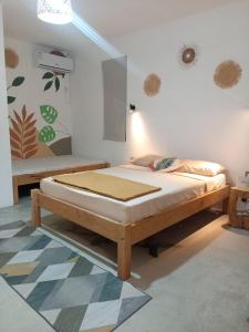 Postel nebo postele na pokoji v ubytování IZAVA LODGE