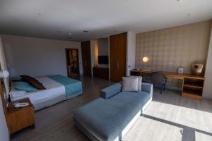 Postel nebo postele na pokoji v ubytování Hotel Ciudad de Ponferrada, Ascend Hotel Collection