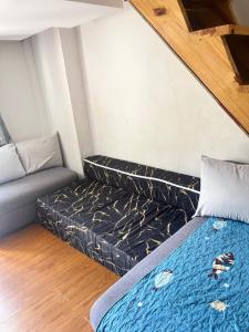 Postel nebo postele na pokoji v ubytování Lexon- Marx Condotel