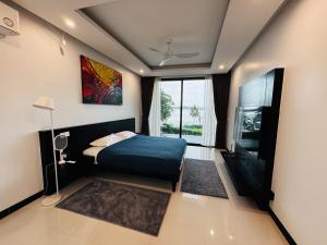 Katil atau katil-katil dalam bilik di Sunrise Ocean Villa 20