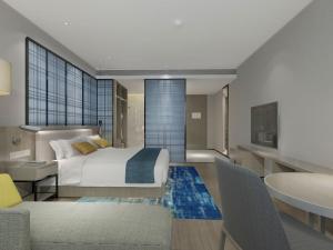 Area soggiorno di Echarm Hotel Changsha Foreign Economics Institute Branch