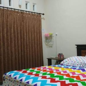 Giường trong phòng chung tại Midi homestay