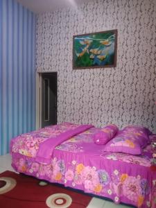 Giường trong phòng chung tại Midi homestay