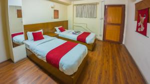 Letto o letti in una camera di Durbar Guest House