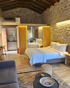 Posteľ alebo postele v izbe v ubytovaní Manifest Boutique Hotel + 37 fotografií