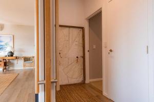 a door with a drawing on it in a room at Cooinda - on the beach - Bicheno in Bicheno +76 photos