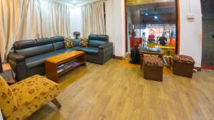 Area soggiorno di Durbar Guest House