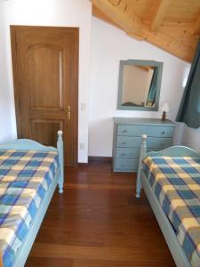 Кровать или кровати в номере Casa Vacanze Villa Elena