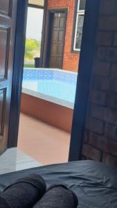 Bazén v ubytování RumaMataAyer Homestay Islam Semabok Perdana - Melaka nebo v jeho okolí