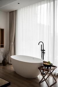 Gambar di galeri bagi Guizhou Kaili Leli Designer Hotel di Bainiu