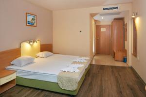 Postel nebo postele na pokoji v ubytování Diamond Hotel - All Inclusive