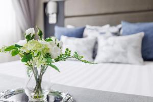 Katil atau katil-katil dalam bilik di The Royal Riviera Hotel Doha