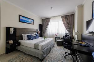 Katil atau katil-katil dalam bilik di The Royal Riviera Hotel Doha