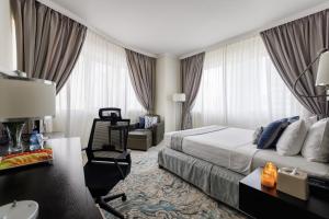 Ruang duduk di The Royal Riviera Hotel Doha
