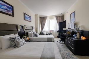 Katil atau katil-katil dalam bilik di The Royal Riviera Hotel Doha