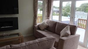 Χώρος καθιστικού στο 4 Bedroom Luxury Lodge Retreat in Lymington